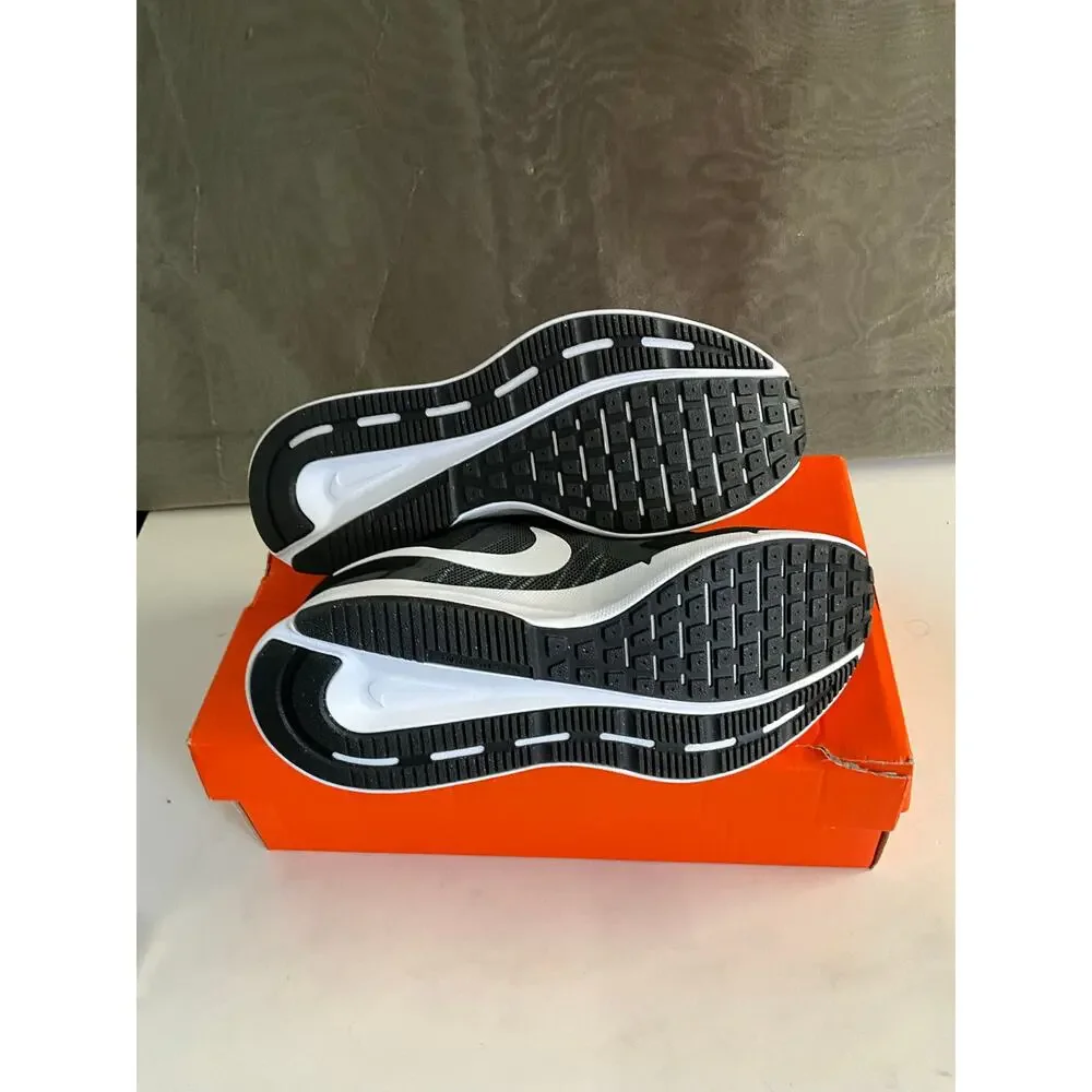 Nike Run Swift 3 sneakers in black and white